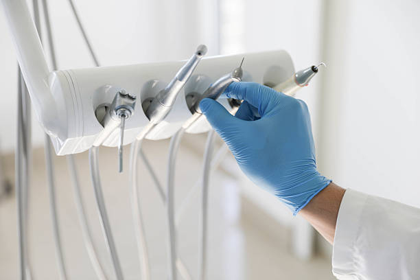 Professional Tooth Extraction technician working in Burlington, KY